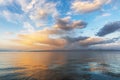 Beautiful sunrise on the lake with colorful clouds . Armenia Sevan lake