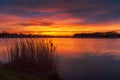 A beautiful sunrise on the lake shore in eastern Poland and a wonderful sky full of colors Royalty Free Stock Photo