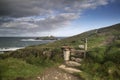 Beautiful sunrise landscape image of Godrevy in Corwnall England