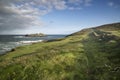 Beautiful sunrise landscape image of Godrevy in Corwnall England