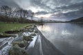 Stunning sunrise landscape image in Winter of Llyn Cwellyn in Sn