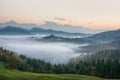 Beautiful sunrise landscape of Saint Thomas Church in Slovenia on hilltop in the morning fog