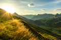 Beautiful sunrise and layered mountain silhouettes in early morning. Lechtal and Allgau Alps, Bavaria and Austria.