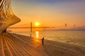 Beautiful Sunrise in Lisbon, Portugal with View of 25 de Abril Bridge Royalty Free Stock Photo