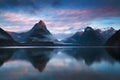 Beautiful sunrise in Milford Sound, New Zealand. Mitre Peak is the iconic landmark of Milford Sound in Fiordland National Park.