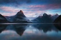 Beautiful sunrise in Milford Sound, New Zealand. Mitre Peak is the iconic landmark of Milford Sound in Fiordland National Park.