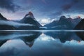 Beautiful sunrise in Milford Sound, New Zealand. Mitre Peak is the iconic landmark of Milford Sound in Fiordland National Park.