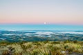 Ibitipoca national park in Brazil view of the city on a morning with full moon