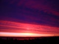 Beautiful sunrise in the north. Cloudy morning with a dawn over Lake Onega. On the horizon are the Ivanovo Islands. Industrial Royalty Free Stock Photo