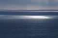 Beautiful sunrise ocean landscape. Sun spots on the sea surface. Royalty Free Stock Photo