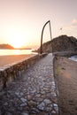 Sunrise over Blanes beach and view of Sa Palomera rock in Spain Royalty Free Stock Photo