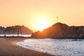 Sunrise over Blanes beach and view of Sa Palomera rock in Spain Royalty Free Stock Photo