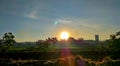 Beautiful sunrise over the grassy rural landscape