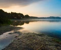 Beautiful sunrise over misty lake. Royalty Free Stock Photo