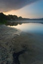 Beautiful sunrise over misty lake. Royalty Free Stock Photo