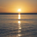 Beautiful sunrise over Pentewan Sands in Cornwall with pastel sky and long exposure ocean Royalty Free Stock Photo