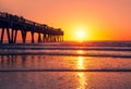 Beautiful sunrise over pier in Florida. Royalty Free Stock Photo