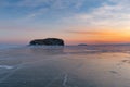Beautiful sunrise over Siberia Baikal water lake Winter season Royalty Free Stock Photo
