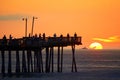 Beautiful sunrise by the fishing pier at Virginia Beach, U.S.A Royalty Free Stock Photo