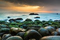 Nature Seascape with Green Moss Covered Rocks Beautiful Sunrise at Queen Beach Royalty Free Stock Photo