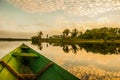 Beautiful sunrise on the river. View from the boat at Amazon river, with a dense forest on the shore and blue sky, Anazonas, Royalty Free Stock Photo