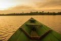 Beautiful sunrise on the river. View from the boat at Amazon river, with a dense forest on the shore and blue sky, Anazonas, Royalty Free Stock Photo