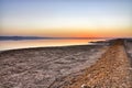 Beautiful sunrise on salt lake Chott el Djerid, Sahara desert, T Royalty Free Stock Photo