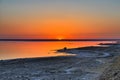 Beautiful sunrise on salt lake Chott el Djerid, Sahara desert, T Royalty Free Stock Photo