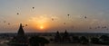 Beautiful sunrise scene of Ancient Pagoda with hot air balloon