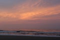 Beautiful sunrise sea beach with dramatic clouds and sky Royalty Free Stock Photo