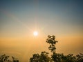 Beautiful sunrise and sea of the fog or mist on top of Phu Kradueng mountain national park in Loei City Thailand Royalty Free Stock Photo