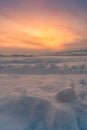 Beautiful sunrise snow covered field land