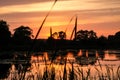 Beautiful sunrise in summer over the lake. reflection