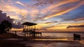 Beautiful sunrise view with fishing pier located in the Lubuk Temiang beach in Labuan Pearl of Borneo,Malaysia.