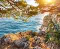 Beautiful sunset above Adriatic sea and coastline in Makarska Royalty Free Stock Photo