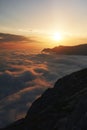 Beautiful sunset above the clouds in the mountains Royalty Free Stock Photo