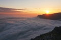 Beautiful sunset above the clouds in the mountains Royalty Free Stock Photo