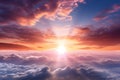 Beautiful sunset above clouds with rays of light Royalty Free Stock Photo