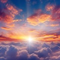 Beautiful sunset above clouds with rays of light Royalty Free Stock Photo