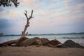 Beautiful sunset above sea or ocean with wave surf on the sandy beach in the evening, vacation and journey time tropical Royalty Free Stock Photo