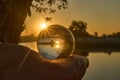 Beautiful sunset in the abstract misrepresentation of a glass ball Royalty Free Stock Photo