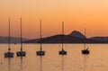 Beautiful sunset on the Aegean Sea with islands and sailboats. Seascape, travel and nature concept Royalty Free Stock Photo