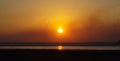 Sea ebb golden sunset over the sea and citythe sun. Sea of Azov .nice . low tide .beautiful sunset