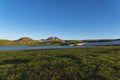 Beautiful sunset alpine lake mountains. Sunset sky over the beautiful mountains and green hills. Royalty Free Stock Photo