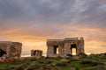 Beautiful sunset with amazing clouds over ruins. Royalty Free Stock Photo