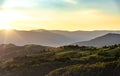 Beautiful sunset on the background of the mountain landscape. Royalty Free Stock Photo