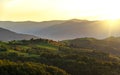 Beautiful sunset on the background of the mountain landscape. Royalty Free Stock Photo