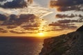 Beautiful sunset on the background of rocks