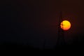 Beautiful sunset background, with silhouette transmission line tower. Royalty Free Stock Photo