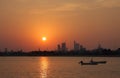 Beautiful sunset with Bahrain skyline and boats Royalty Free Stock Photo